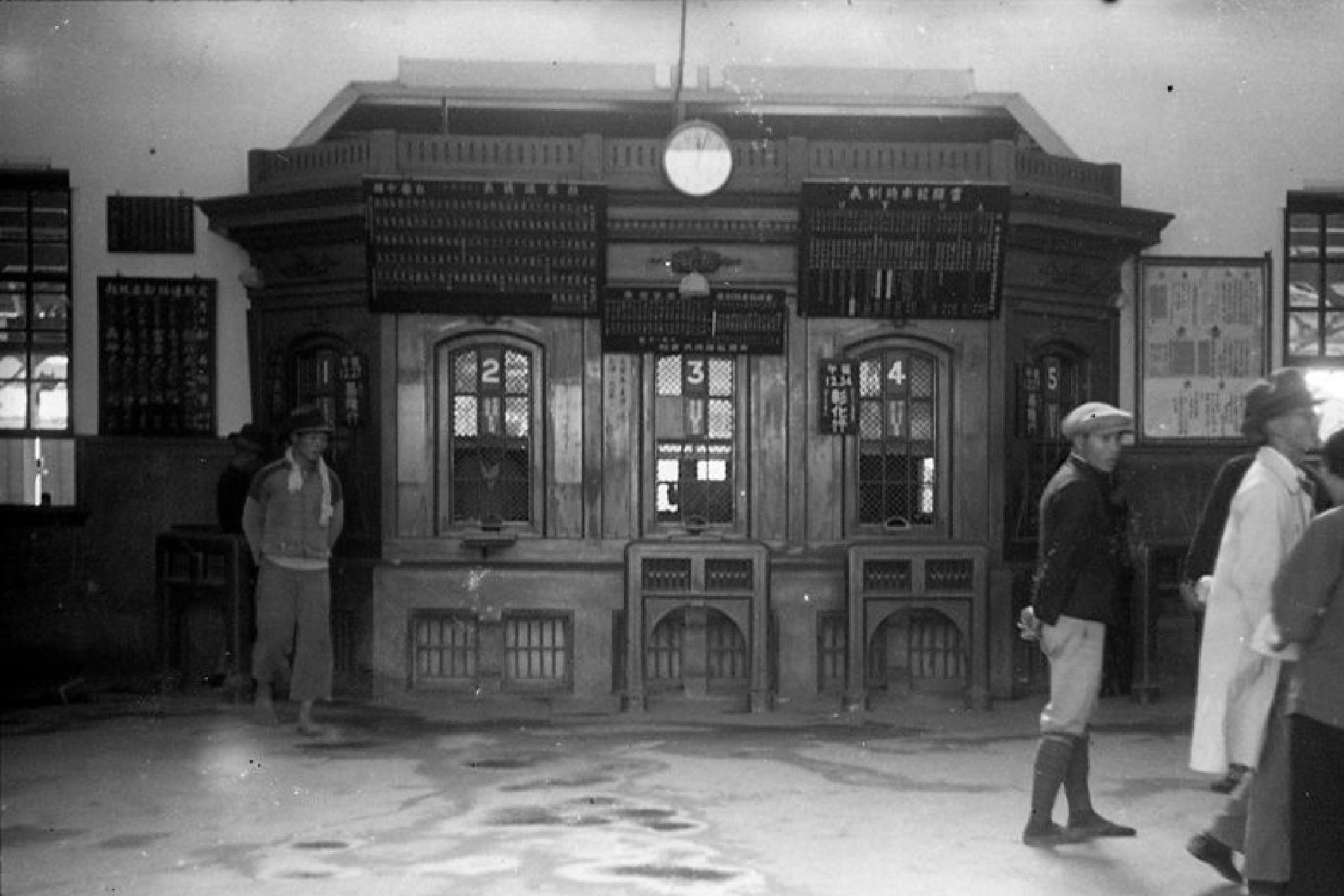 Exquisite wooden ticket counter in the station concourse during the 1940s